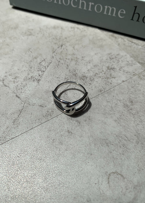 Cross design ring.