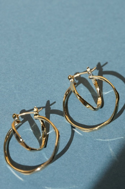 gold circle pierce