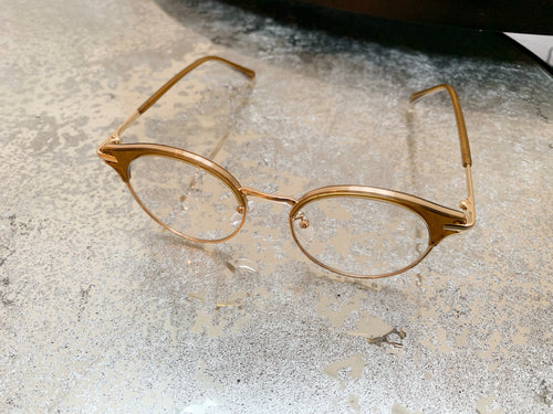 Half frame brown glasses